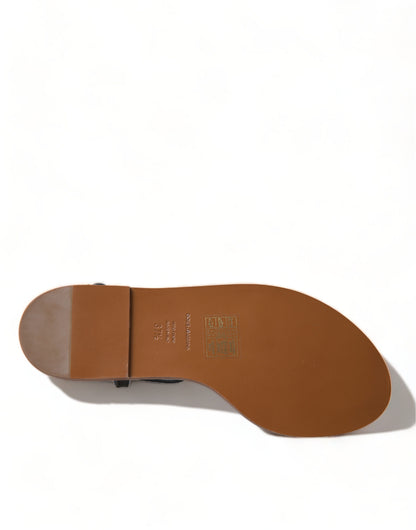 صندل دولتشي آند غابانا الأسود الكريستالي الذهبي حذاء جلدي