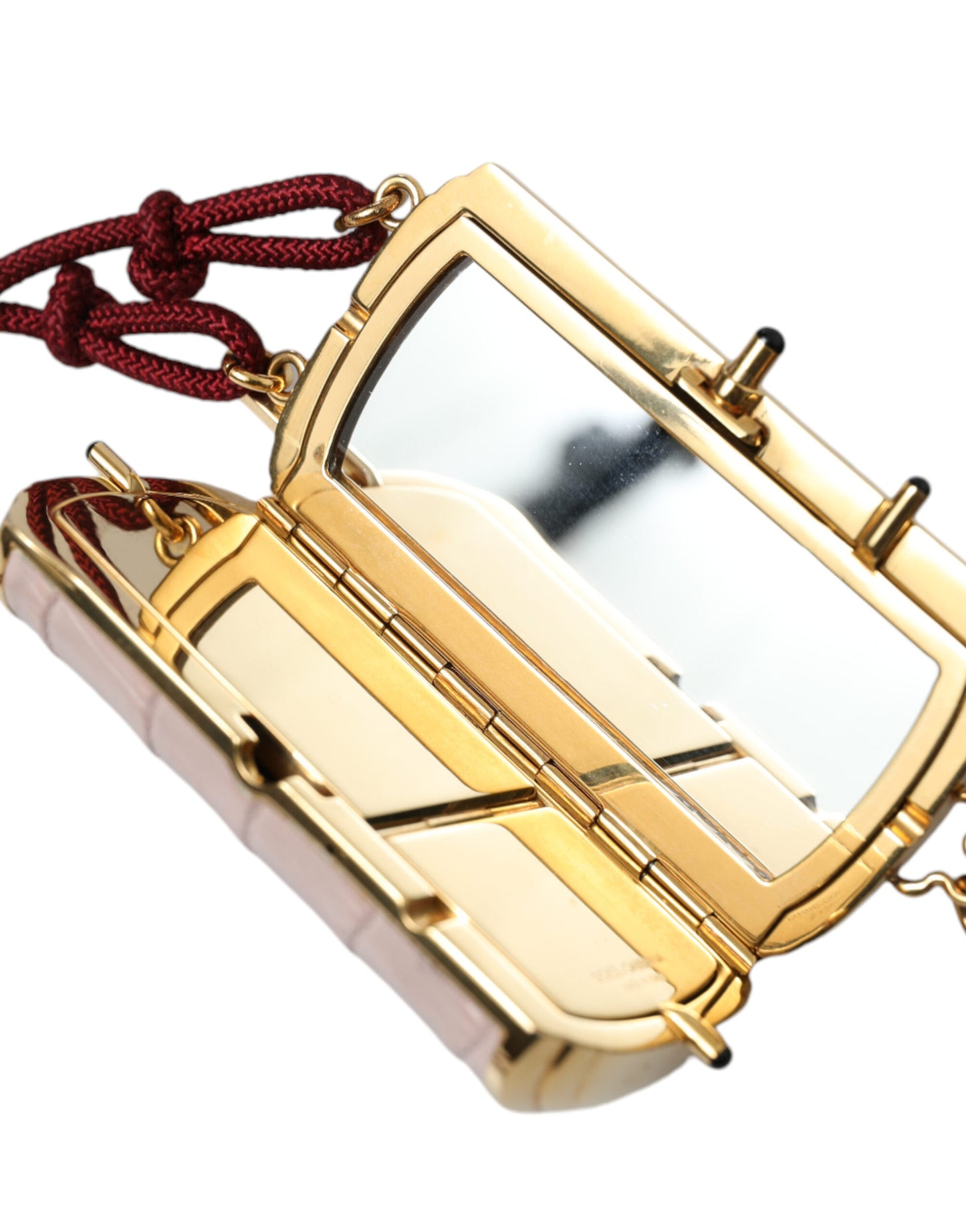 حقيبة مكياج دولتشي آند غابانا الوردية المصنوعة من الجلد الغريب والمزينة بشراشيب صغيرة