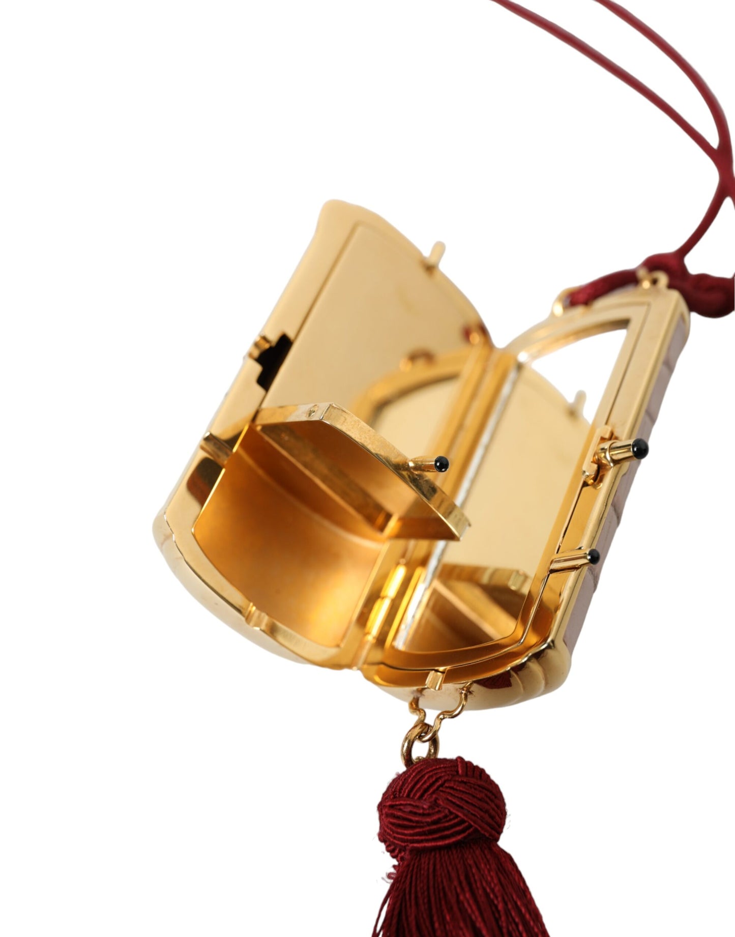 حقيبة مكياج دولتشي آند غابانا الوردية المصنوعة من الجلد الغريب والمزينة بشراشيب صغيرة