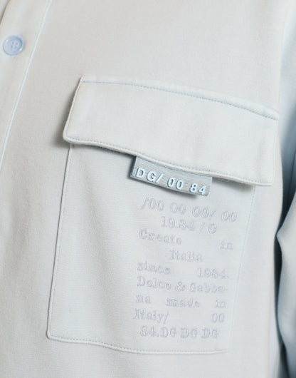 Dolce &amp; Gabbana Hellblauer Pullover aus Baumwolle mit Knöpfen