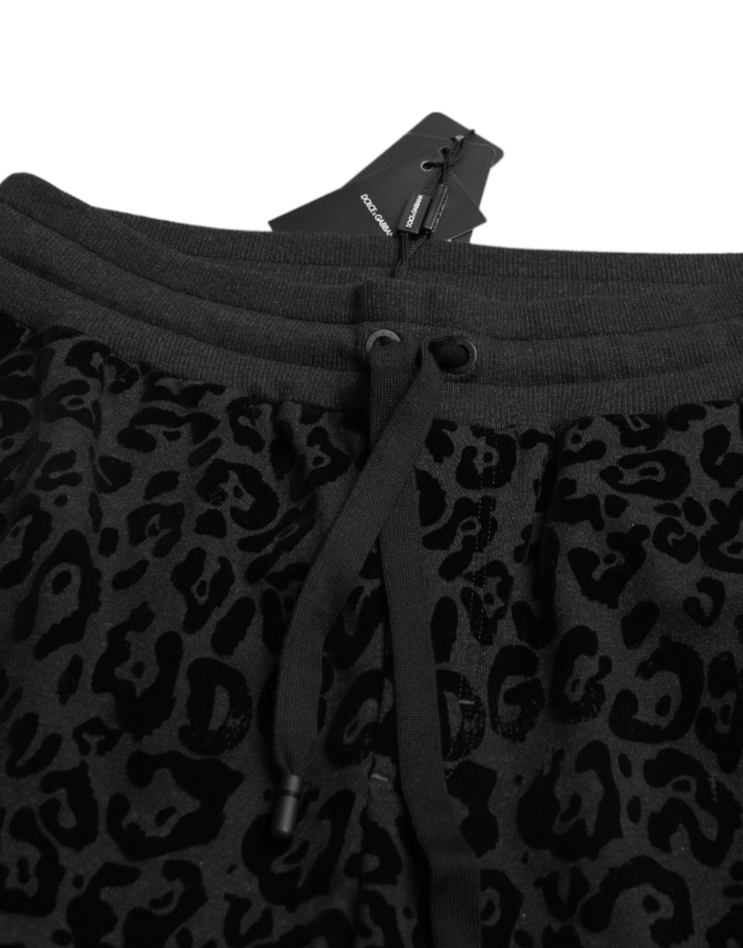 Dolce &amp; Gabbana – Schwarze Jogginghose aus Baumwolle mit Leopardenmuster und schmaler Passform