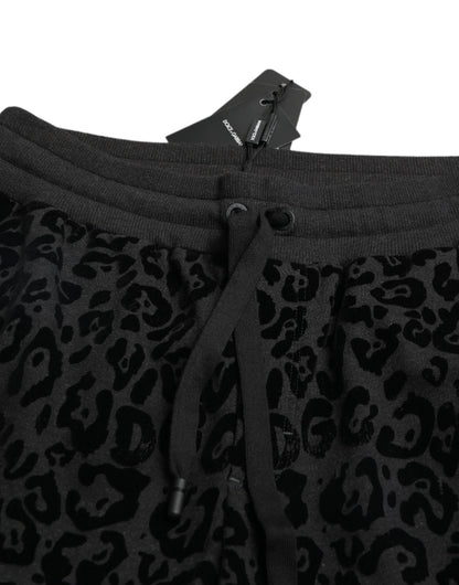 Dolce &amp; Gabbana – Schwarze Jogginghose aus Baumwolle mit Leopardenmuster und schmaler Passform