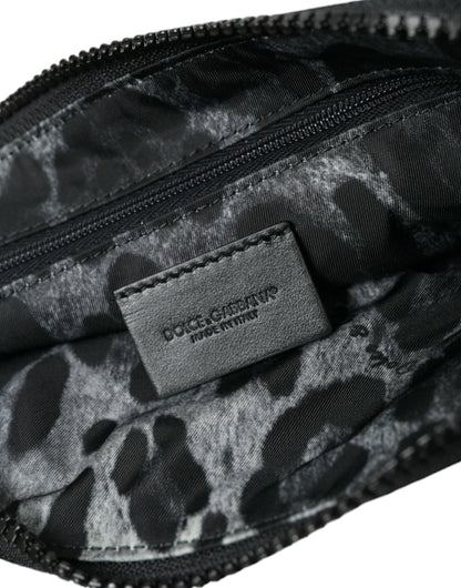 Dolce &amp; Gabbana – Schwarze Clutch aus Nylon mit Schlüsselanhänger und Logo-Plakette