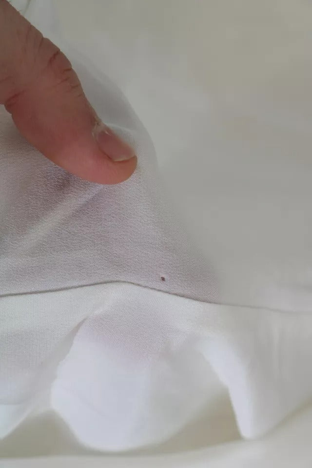 Dolce &amp; Gabbana – Seidentop mit Schalkragen und langen Ärmeln in Off-White