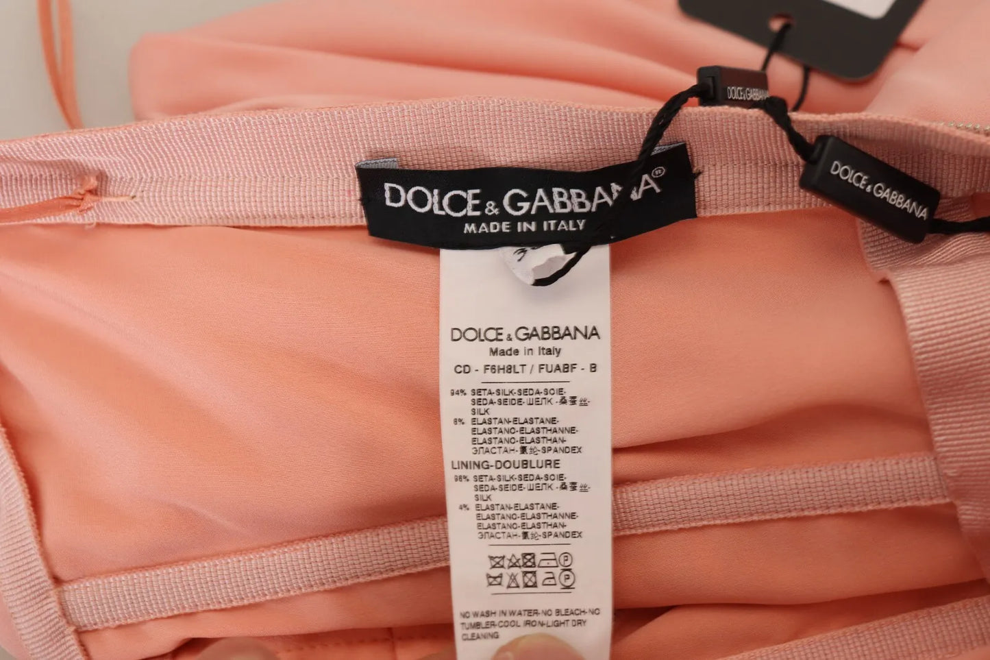 Dolce &amp; Gabbana – Trägerloses Midi-Etuikleid aus Stretch-Seide in Rosa