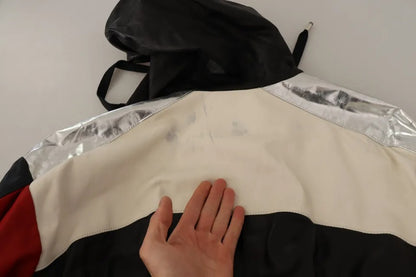 Dolce &amp; Gabbana – Schwarze Blousonjacke aus Leder mit Kapuze