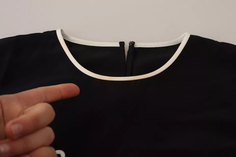 Dolce &amp; Gabbana Schwarzes ärmelloses Seiden-Tanktop mit Eleganza-Print