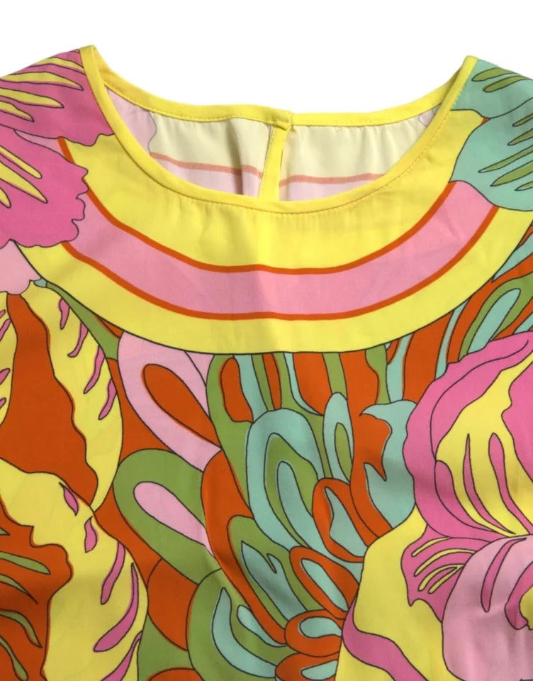 بلوزة دولتشي آند غابانا الحريرية متعددة الألوان بدون أكمام مزينة بالزهور