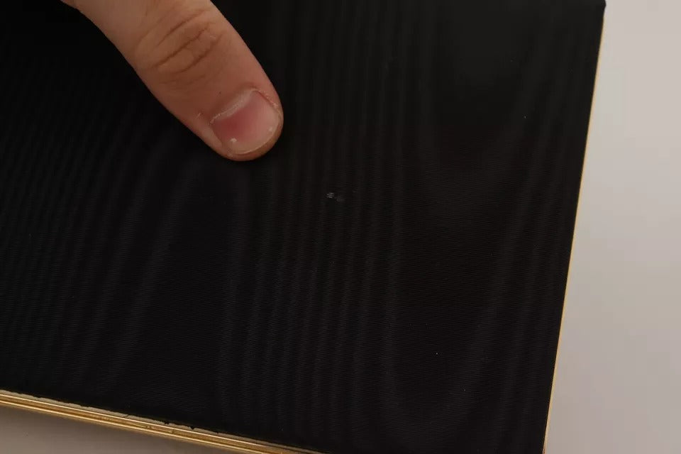 Dolce &amp; Gabbana Clutch aus schwarzer Seide mit Goldrahmen, Abendtasche