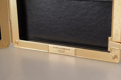 Dolce &amp; Gabbana Clutch aus schwarzer Seide mit Goldrahmen, Abendtasche