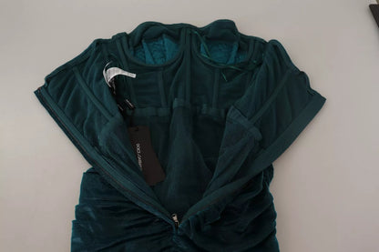 فستان دولتشي آند غابانا فيروزي اللون مع صدرية متوسطة الطول.