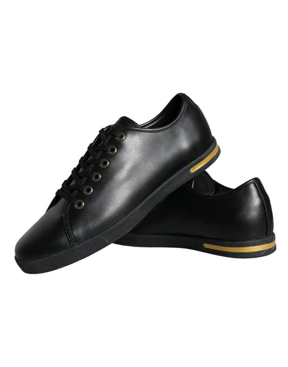 Dolce &amp; Gabbana Klassische Sneakers aus schwarzem und goldenem Leder