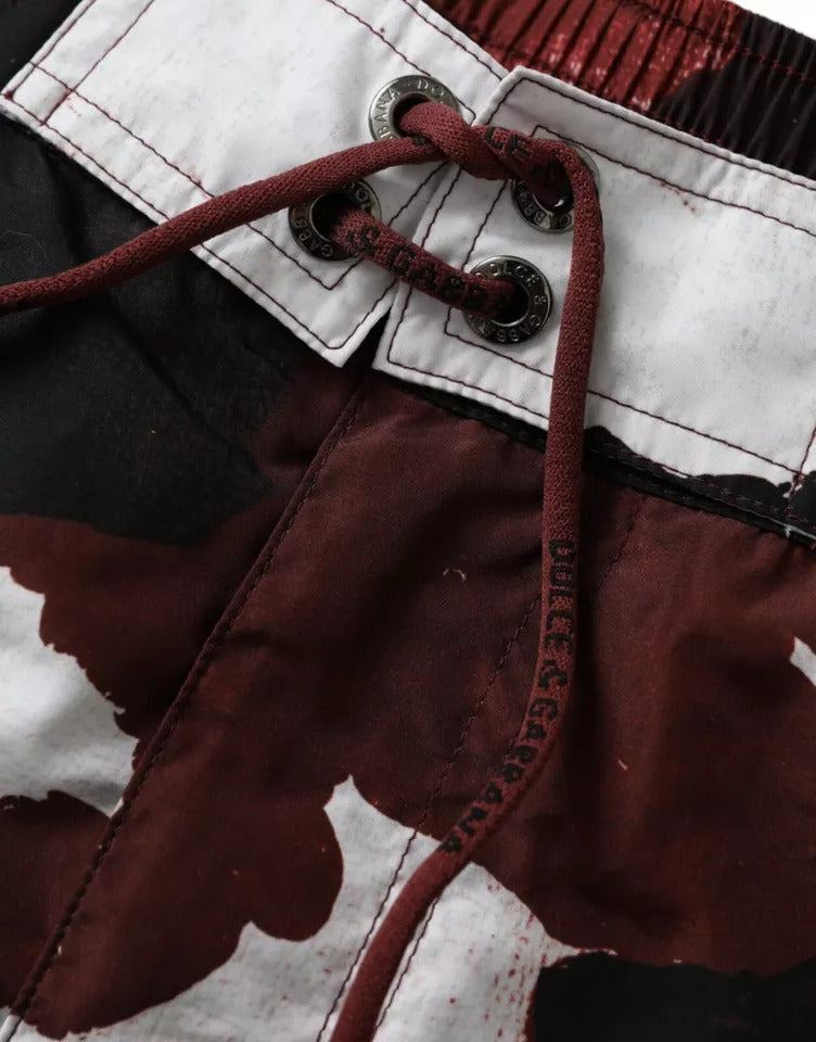 شورت سباحة متعدد الألوان من دولتشي آند غابانا بشعار DG مموه