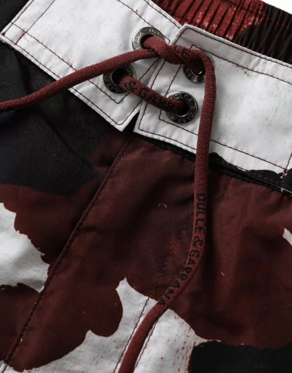 شورت سباحة متعدد الألوان من دولتشي آند غابانا بشعار DG مموه