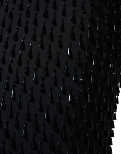 تنورة دولتشي آند غابانا متوسطة الطول بقصّة قلم رصاص ومزينة باللون الأسود