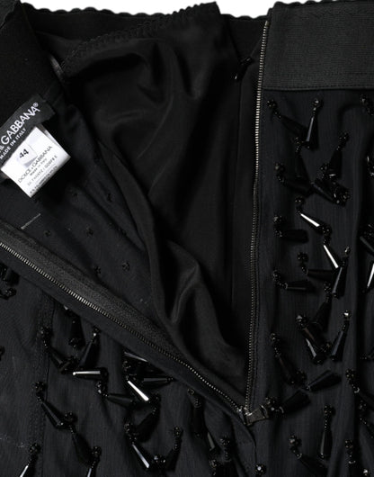 تنورة دولتشي آند غابانا متوسطة الطول بقصّة قلم رصاص ومزينة باللون الأسود