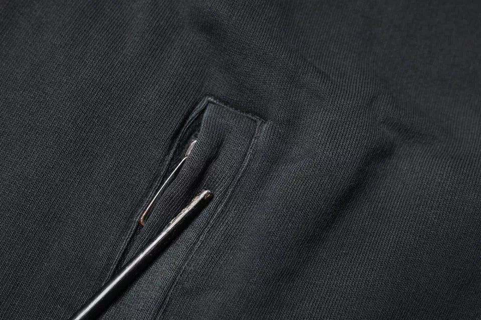 سترة دولتشي آند غابانا سوداء بغطاء رأس وسحاب كامل