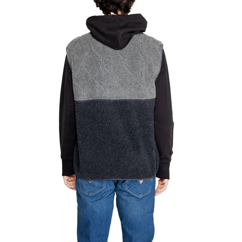 Tommy Hilfiger Jeans – Ärmellose Jacke aus recyceltem Polyester in Schwarz