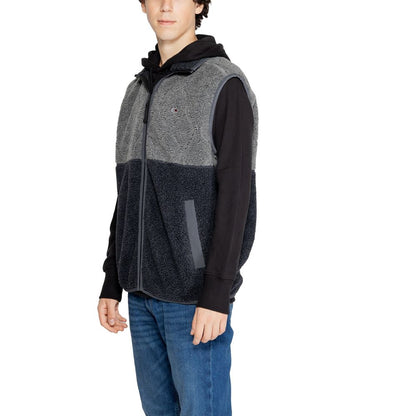 Tommy Hilfiger Jeans – Ärmellose Jacke aus recyceltem Polyester in Schwarz