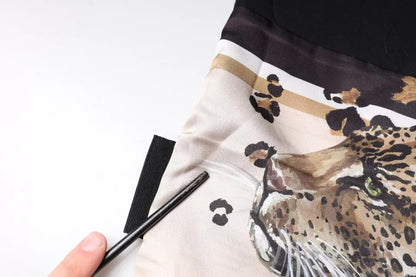 Dolce &amp; Gabbana Schwarzes Kurzarm-T-Shirt aus Baumwolle mit Leopardenmuster