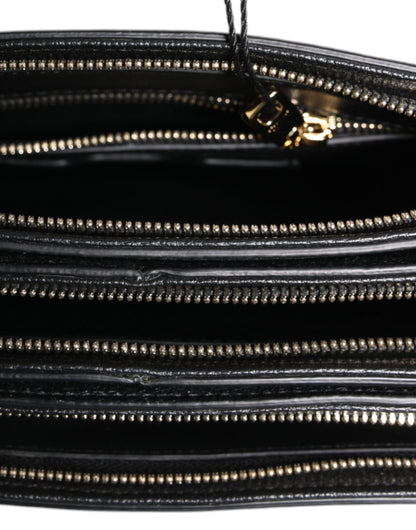 Dolce &amp; Gabbana – Clutch aus schwarzem genarbtem Leder mit Logo-Plakette