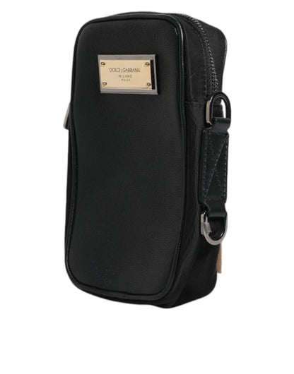 Dolce &amp; Gabbana – Clutch aus schwarzem genarbtem Leder mit Logo-Plakette