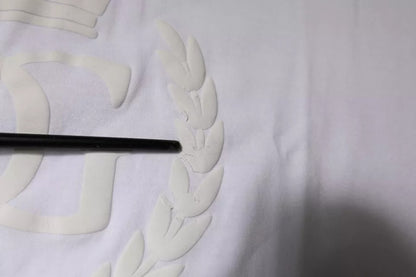 Dolce &amp; Gabbana – Weißes Baumwoll-T-Shirt mit Rundhalsausschnitt und Logoprägung