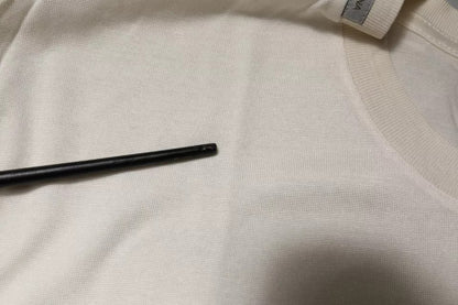 Dolce &amp; Gabbana – Kurzärmliges T-Shirt aus Seide mit Rundhalsausschnitt in Off-White