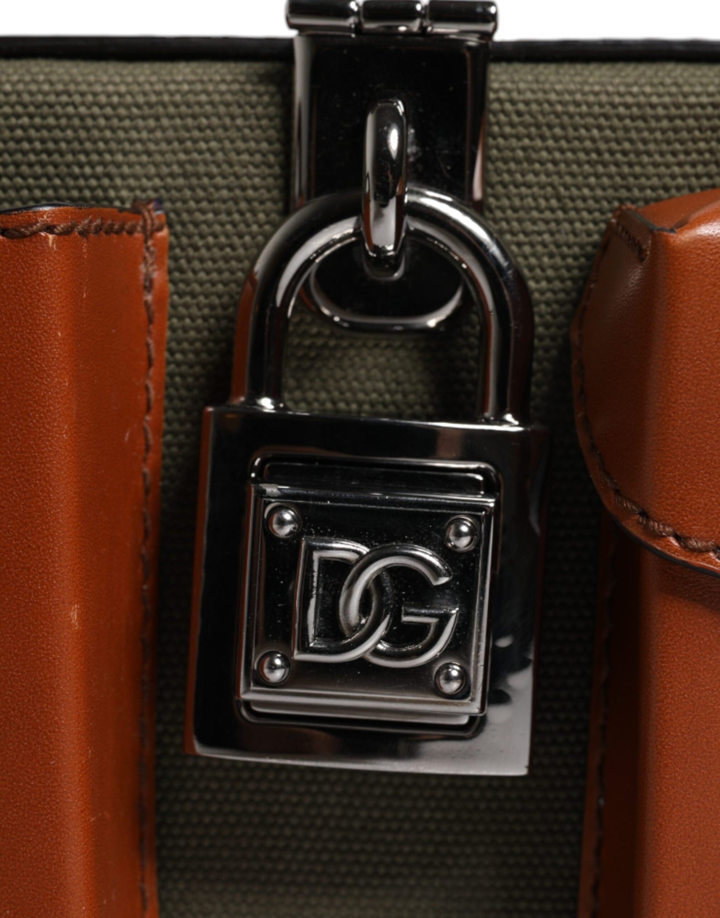 Dolce &amp; Gabbana Clutch aus grünem und braunem Leder