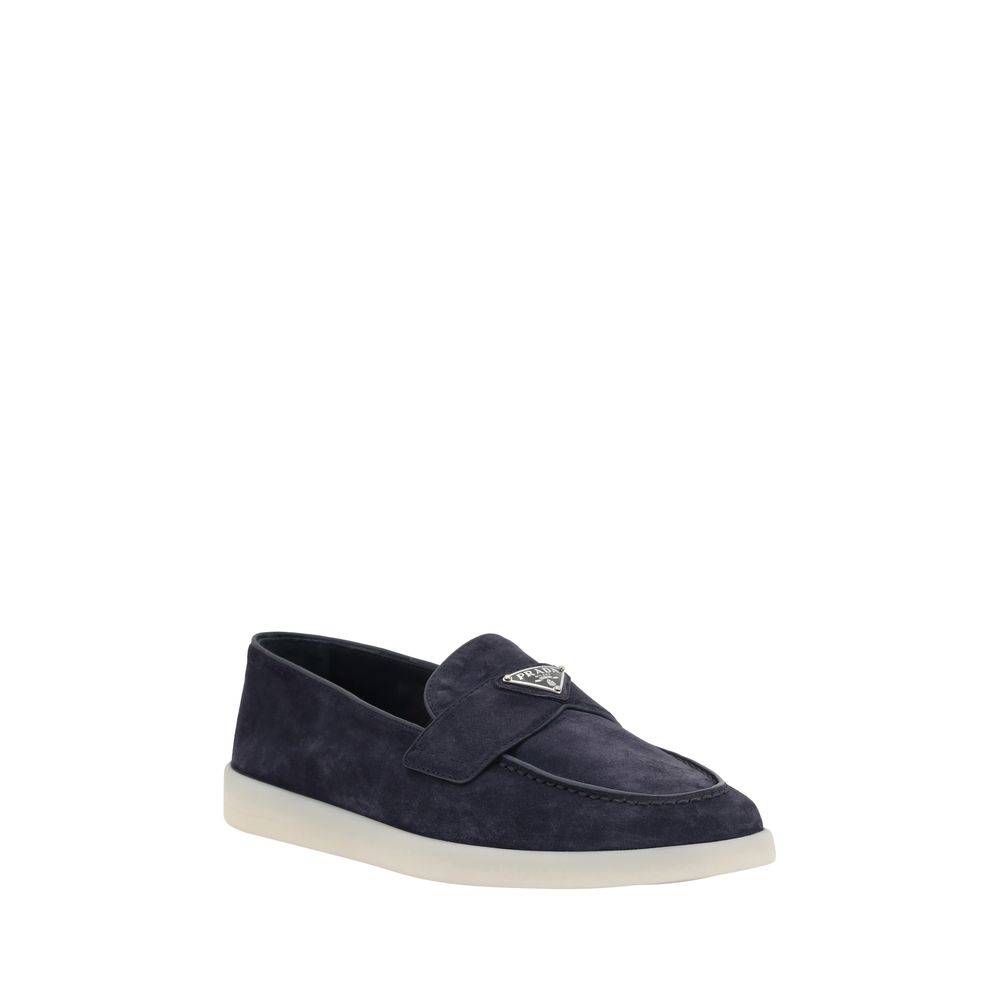 Prada Blaue Slipper aus Gummi