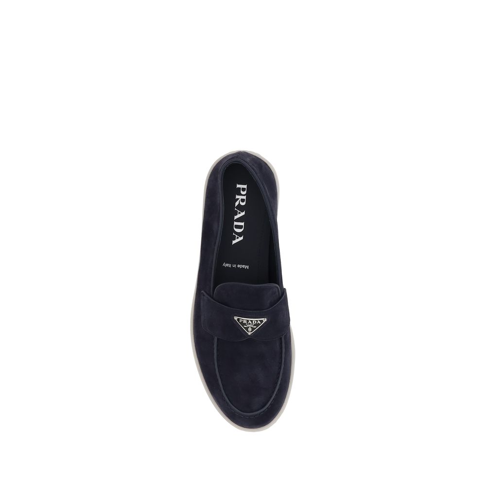Prada Blaue Slipper aus Gummi