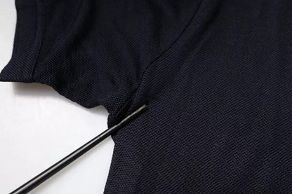 Dolce &amp; Gabbana – Blaues Polo-T-Shirt aus Seide mit Kragen und kurzen Ärmeln