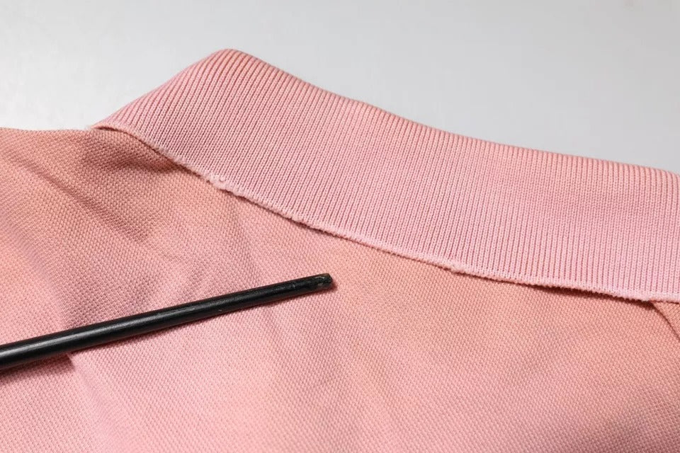 Dolce &amp; Gabbana – Kurzärmliges Poloshirt mit rosa Kronenkragen