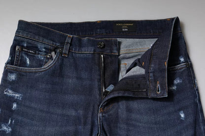 Dolce &amp; Gabbana – Slim Fit-Jeans aus Baumwolle mit Logo-Print in Blau