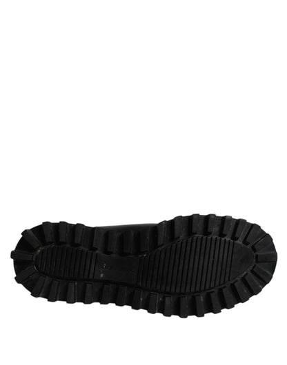 حذاء دولتشي آند غابانا أسود بشعار DG وجوارب حصان للكاحل