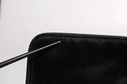 Dolce &amp; Gabbana – Schwarze Clutch aus Nylon mit Schlüsselanhänger und Logo-Plakette