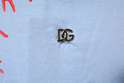Dolce &amp; Gabbana Hellblaues T-Shirt aus korallenfarbener Baumwolle für Herren mit Rundhalsausschnitt