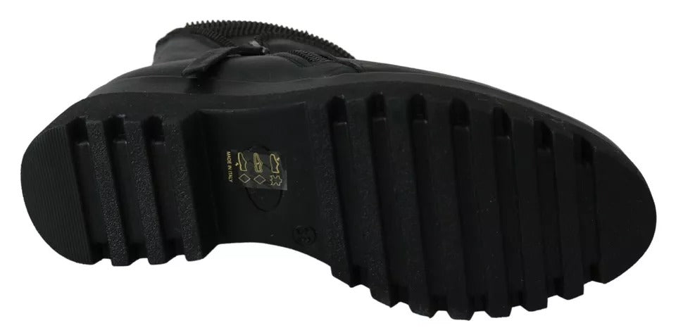 Ovyé Schwarze Lederstiefeletten mit Reißverschluss