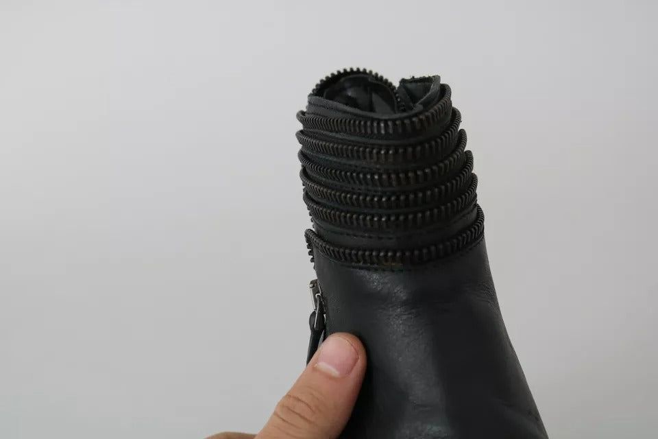 Ovyé Schwarze Lederstiefeletten mit Reißverschluss