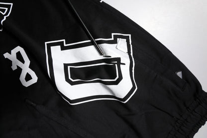 Dolce &amp; Gabbana – Schwarze Bermuda-Sweatshorts aus Baumwolle mit Logo