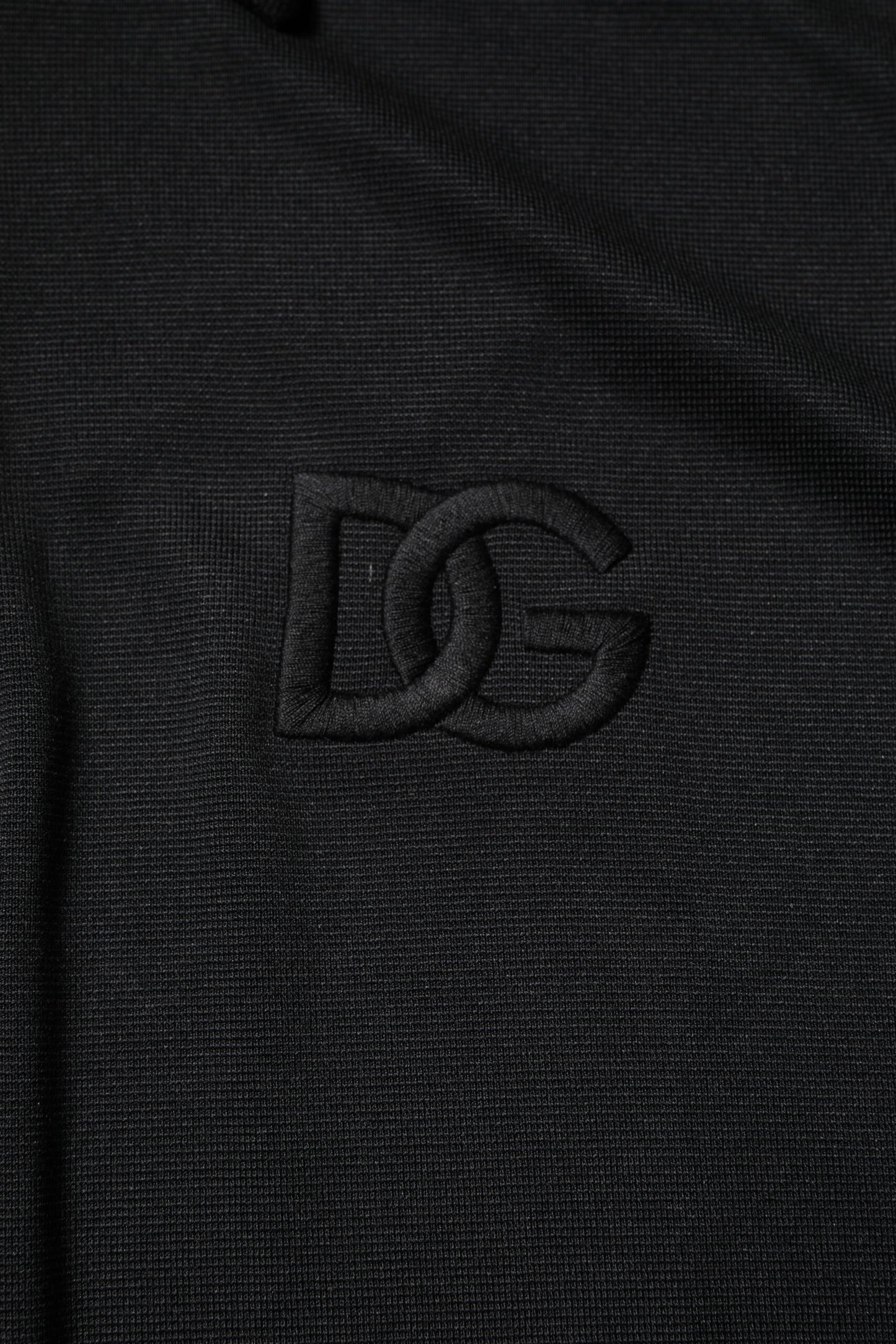 Dolce &amp; Gabbana – Schwarzes Poloshirt aus Polyester mit DG-Logo und Kragen