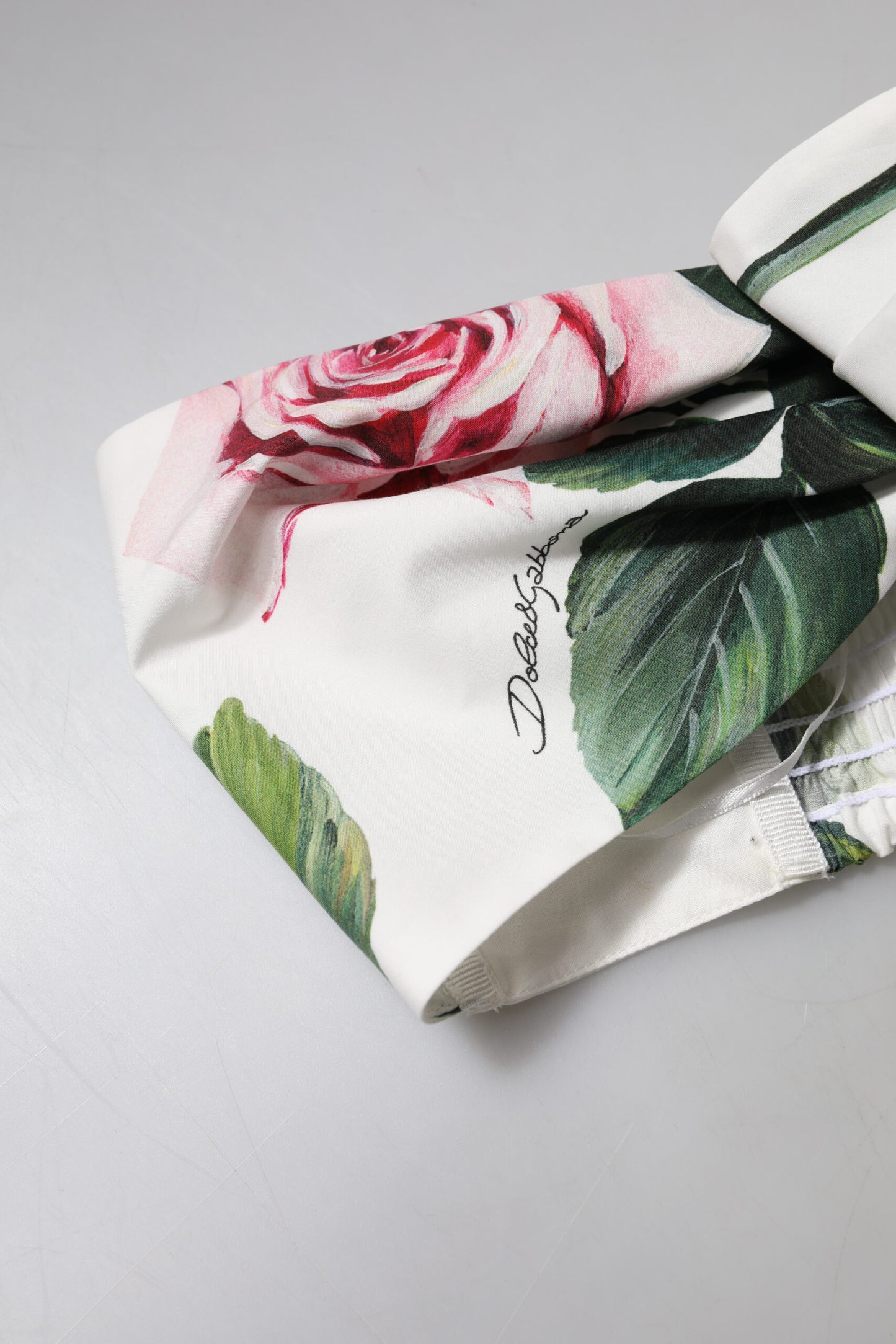 Dolce &amp; Gabbana – Kurzes Bustier-Korsett-Oberteil mit Blumenmuster in Weiß