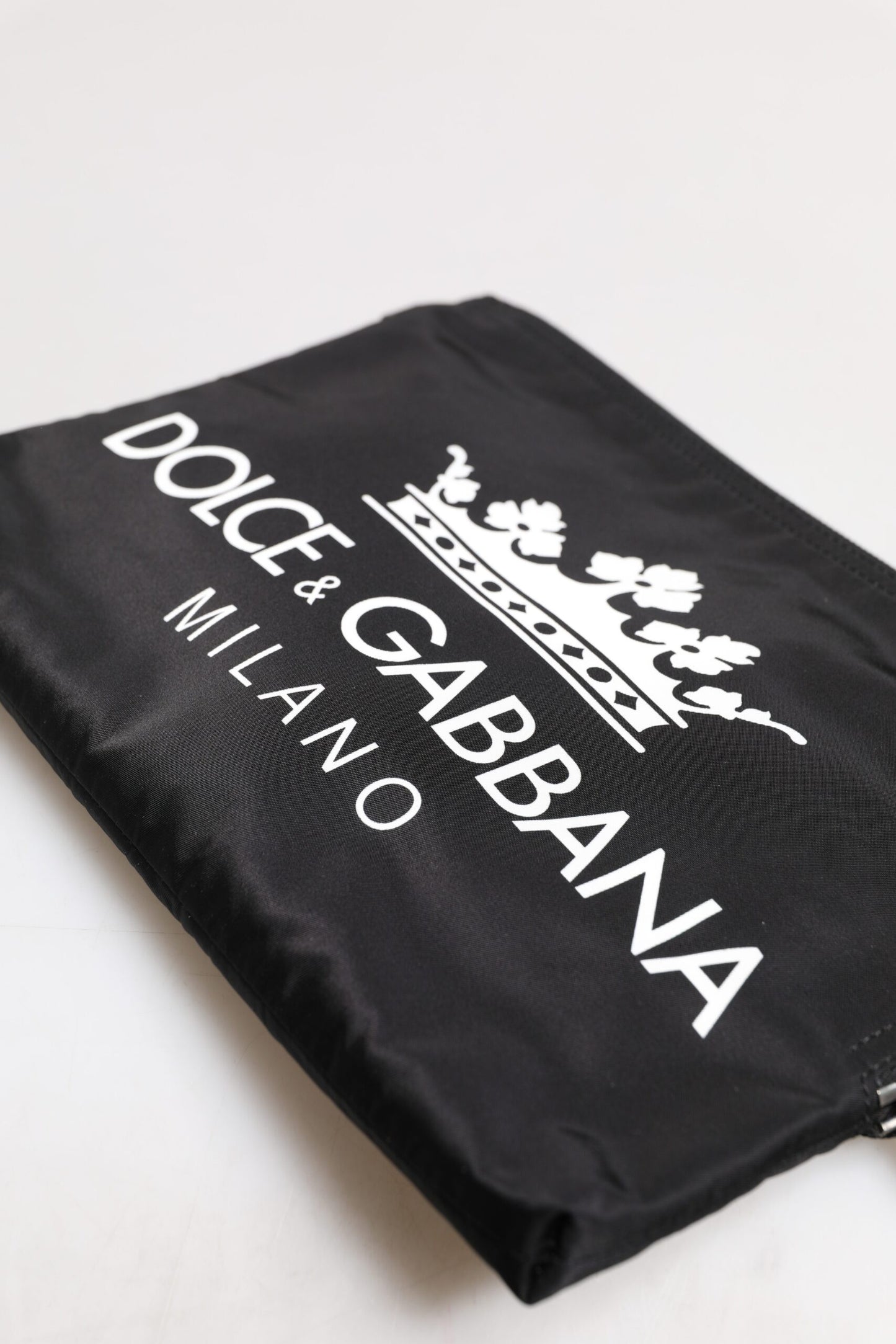 Dolce &amp; Gabbana Schwarze Clutch aus Nylon mit DG Milano-Print