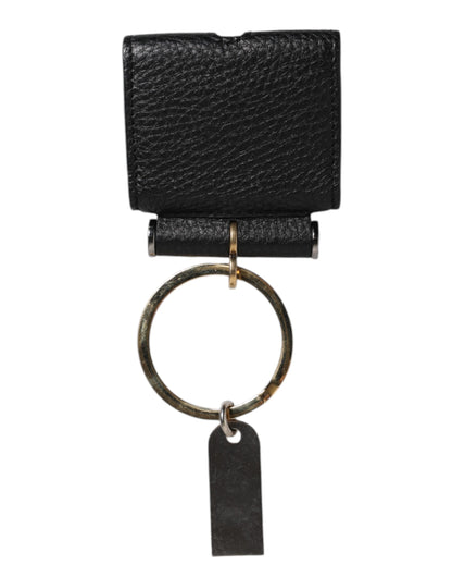 حافظة سماعات Airpods من دولتشي آند غابانا، بحزام جلدي أسود، ولوحة معدنية ذهبية بشعار دولتشي آند غابانا