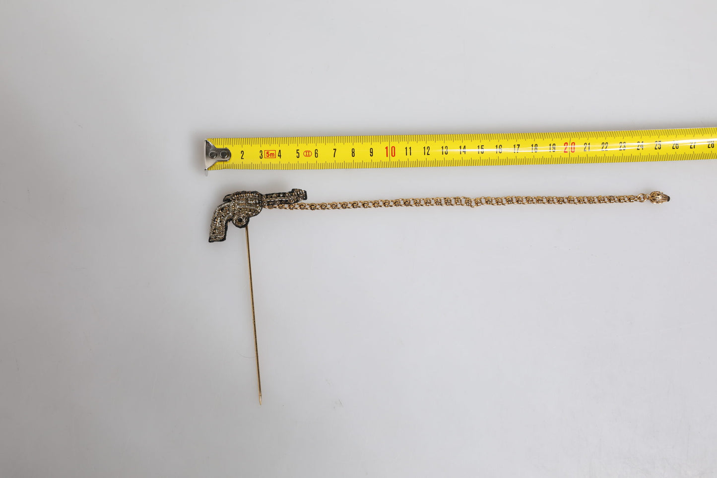 Dolce &amp; Gabbana Revolver-Brosche, Anstecknadel, Schwarzgold, Messing, Kupfer