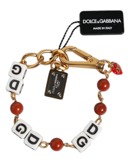 Dolce &amp; Gabbana – Mehrfarbiges, goldfarbenes Messingkettenarmband mit DG-Logo und Würfeln