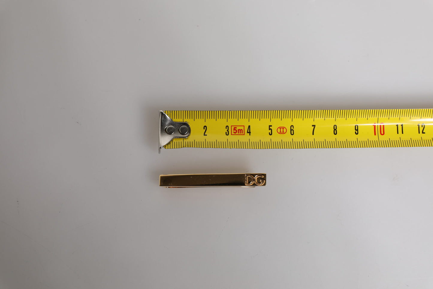 Dolce &amp; Gabbana Krawattenklammer aus goldfarbenem Messing mit Logo