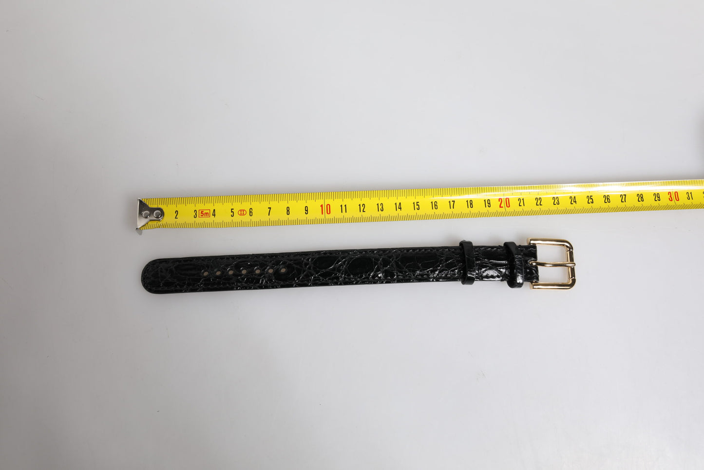 Dolce &amp; Gabbana Armband aus schwarzem exotischem Leder mit goldfarbener Metallschnalle