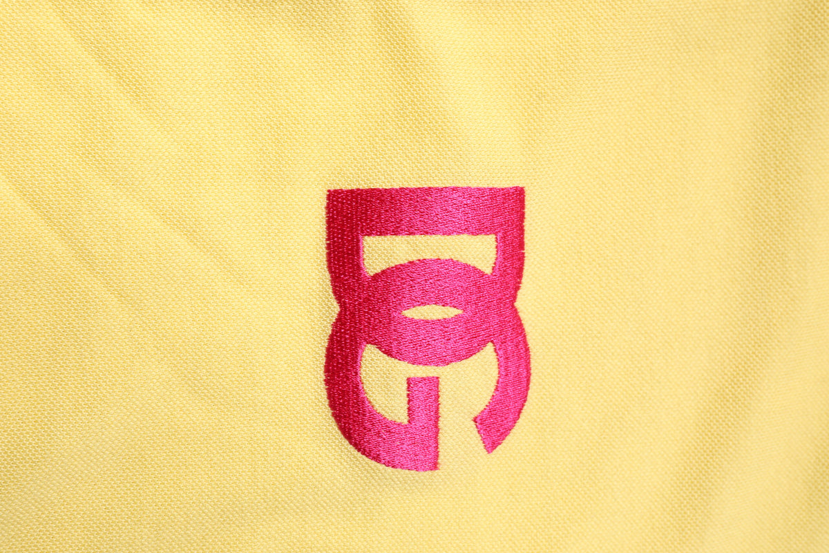 Dolce &amp; Gabbana – Gelbes Poloshirt aus Baumwolle mit Logo und Kragen