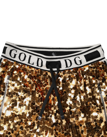 Dolce &amp; Gabbana – Jogginghose mit Pailletten und DG-Logo in Metallic-Gold